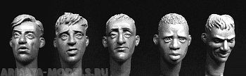 HH43 5 heads with hair, 1 African, 4 Europeans